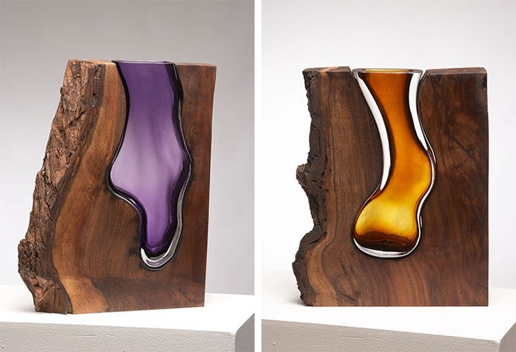 Splendide sculture in vetro all'interno di tronchi d'albero