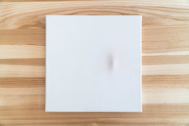 Wie repariert man eine eingedrückte Malerleinwand?