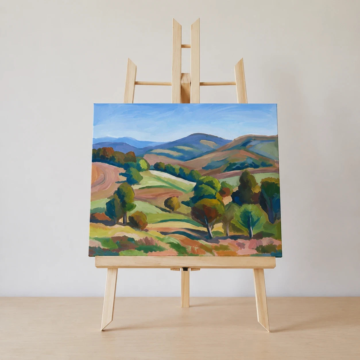 Quadro finito su un cavalletto da tavolo in legno